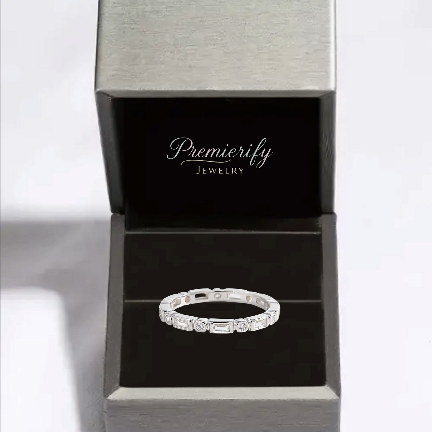 Silver ring in an open Premierify Jewelry box on a white background
