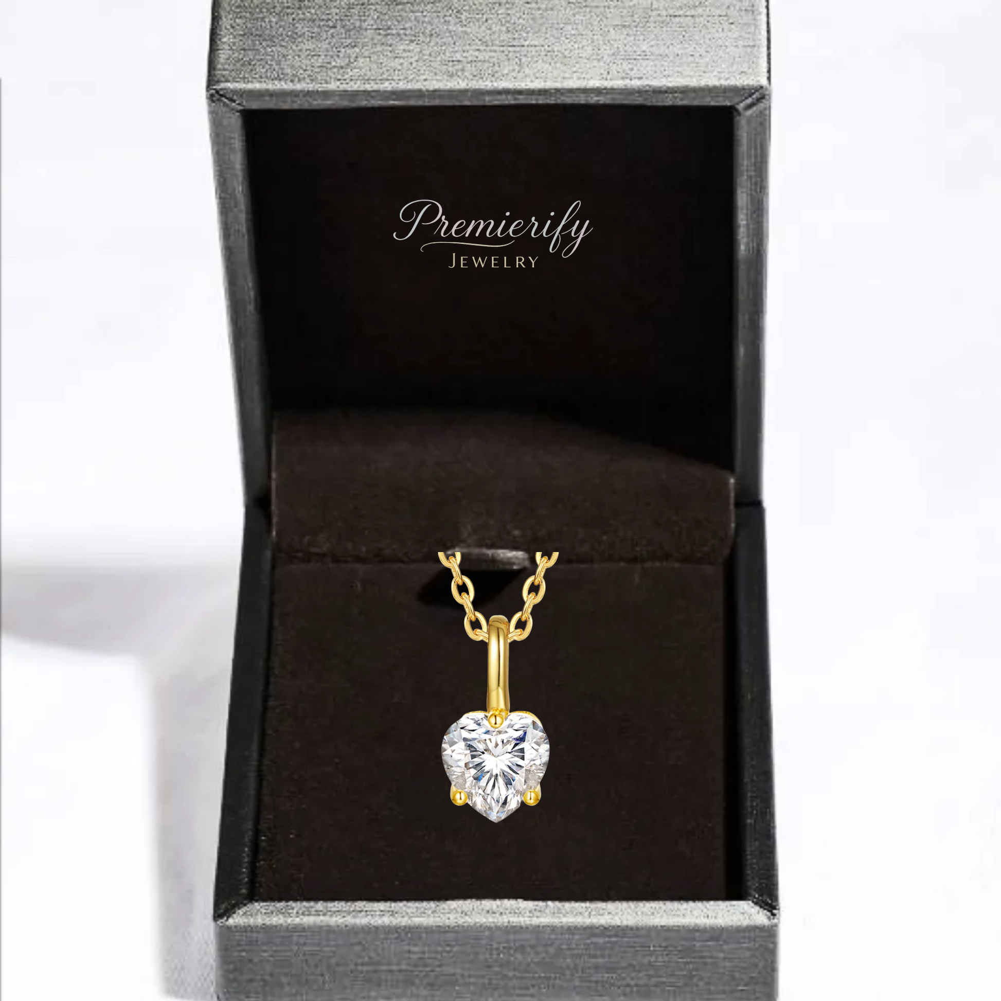Gold heart-shaped pendant necklace in a Premierify Jewelry box.