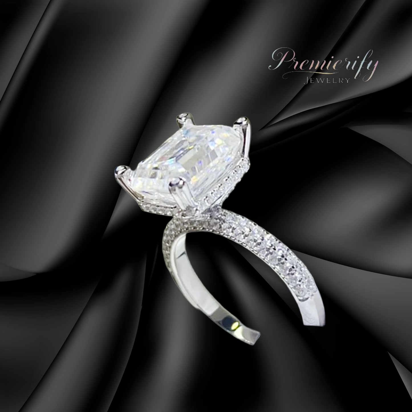 Diamond ring with 'Premierify Jewelry' branding on a black fabric background