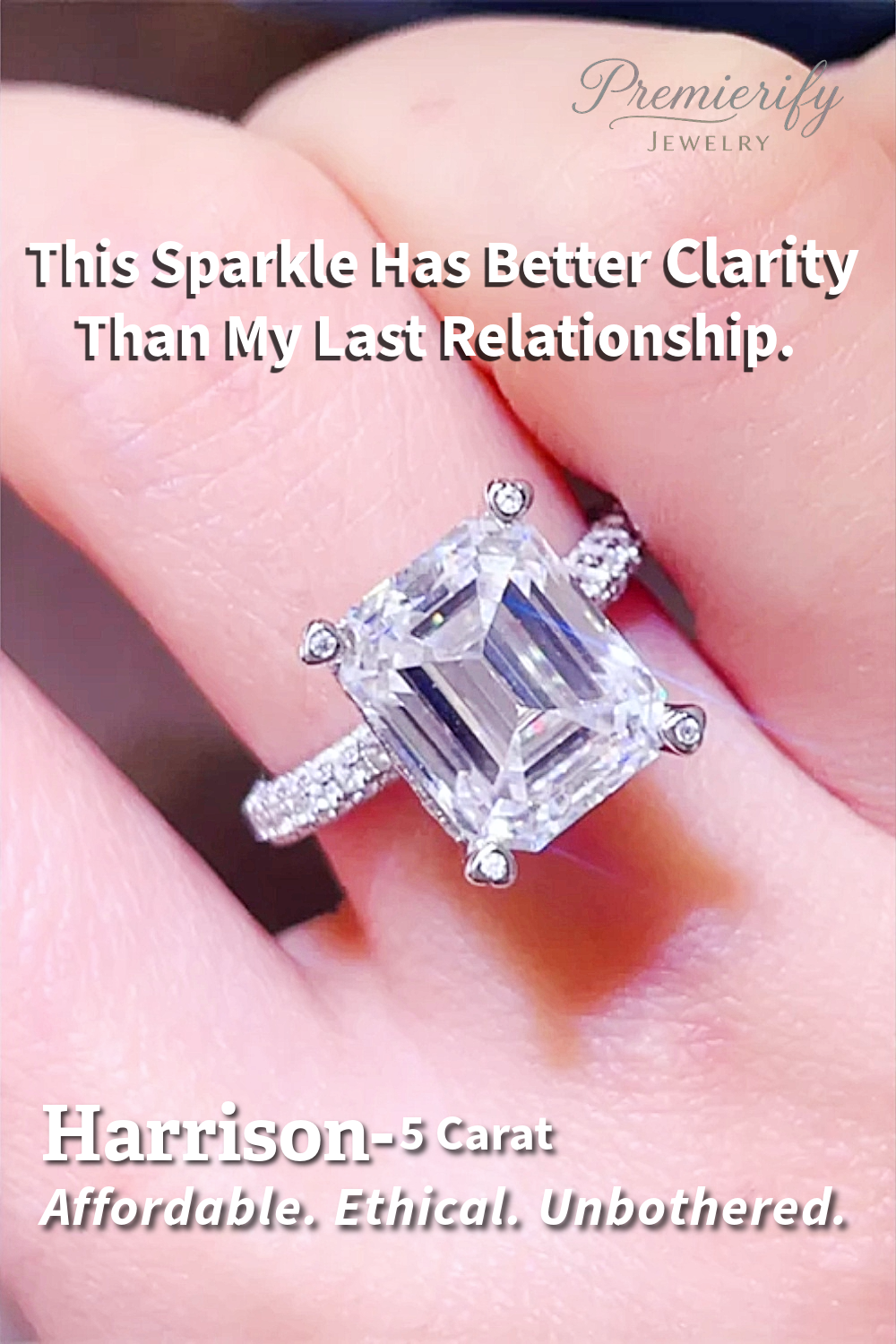 Diamond ring held in hand with promotional text overlay