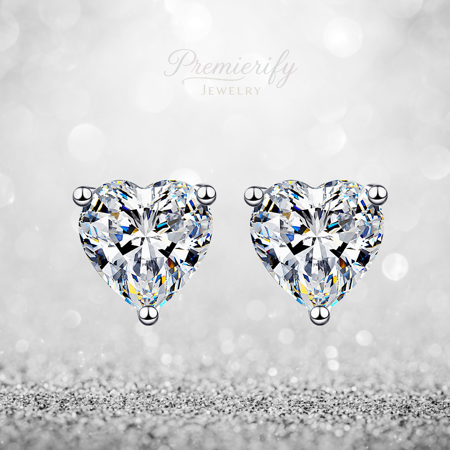 Heart-shaped diamond earrings on a silver background with 'Premierify Jewelry' branding.