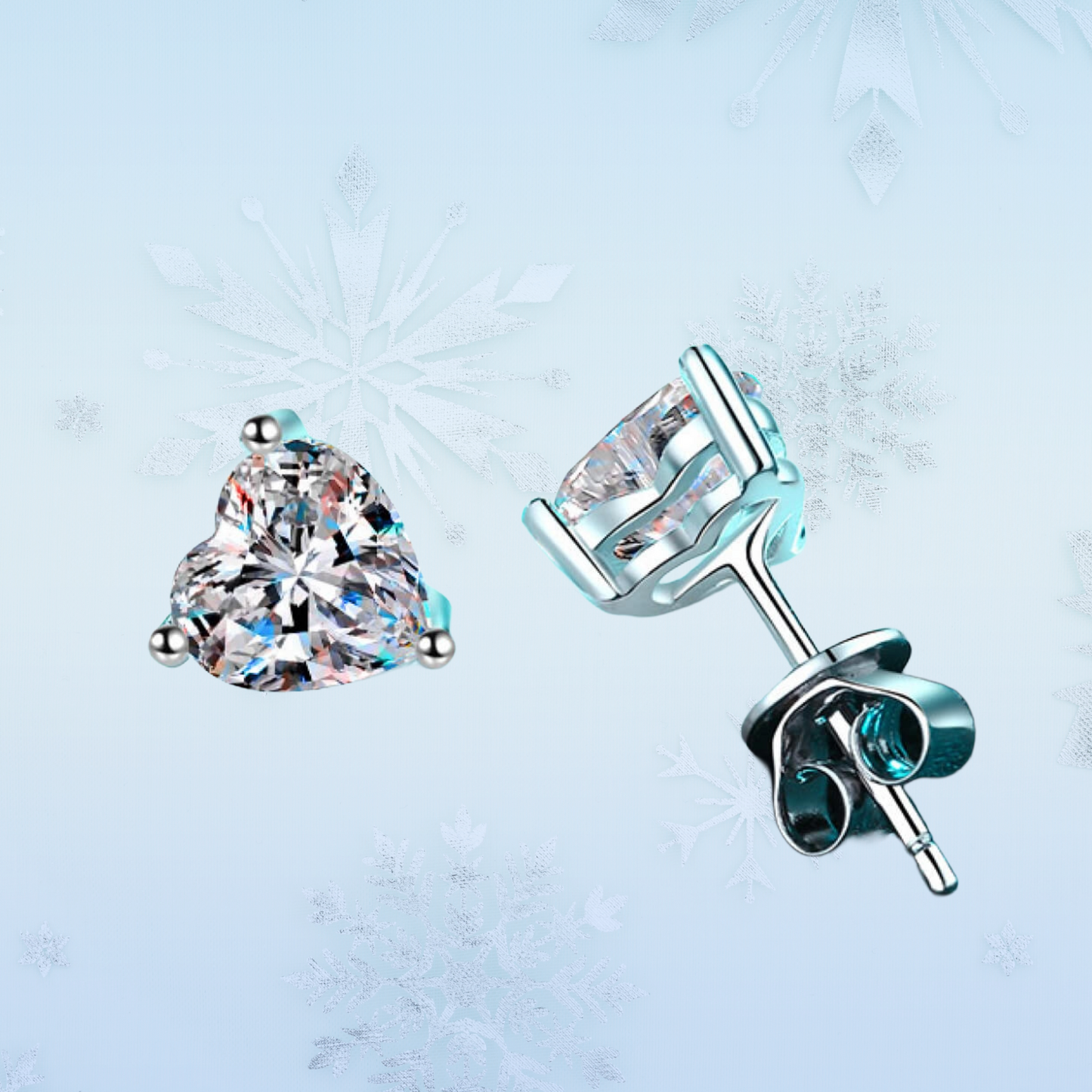 Two diamond stud earrings on a light blue textured background