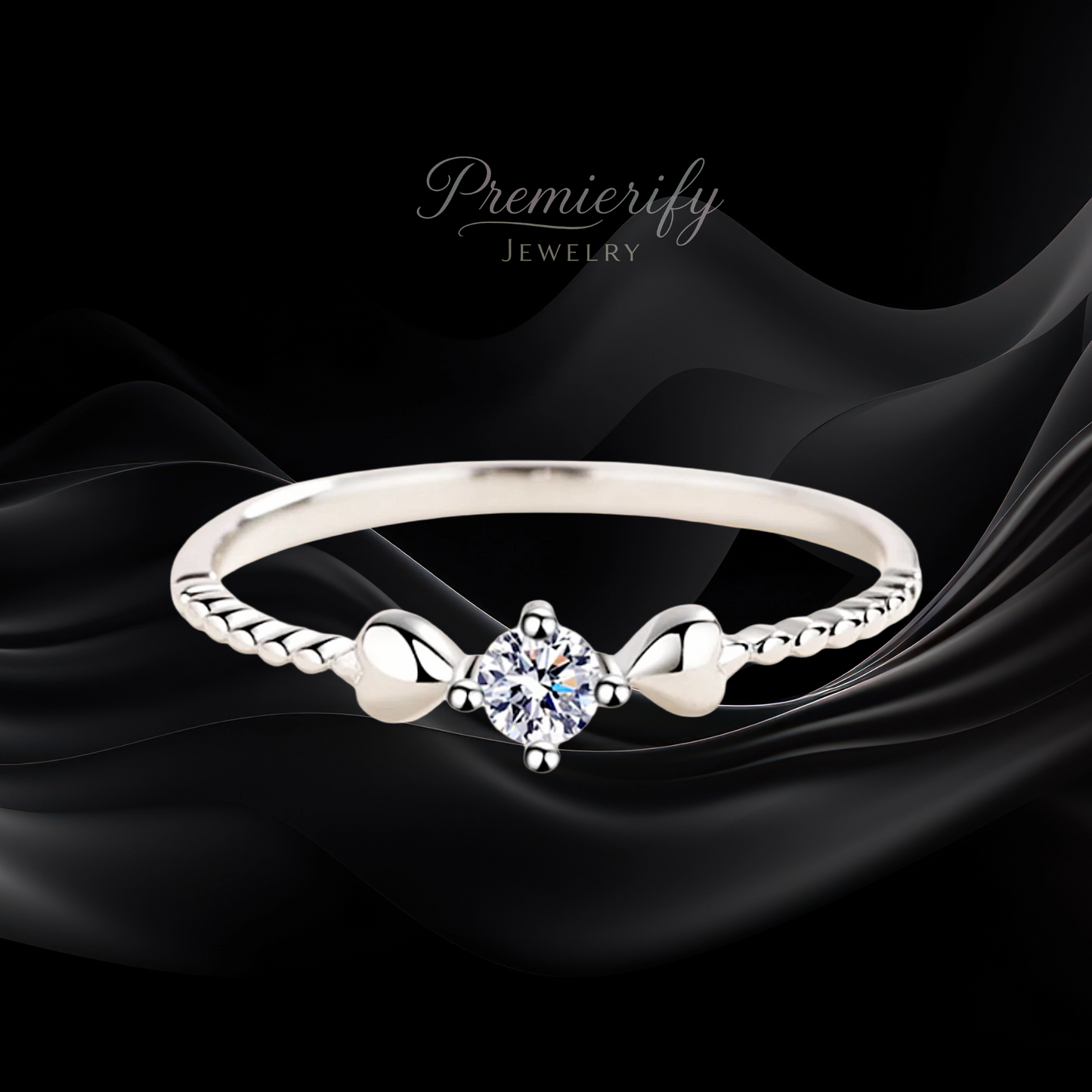 Silver ring with a diamond on a black fabric background, featuring the brand 'Premierify Jewelry'.