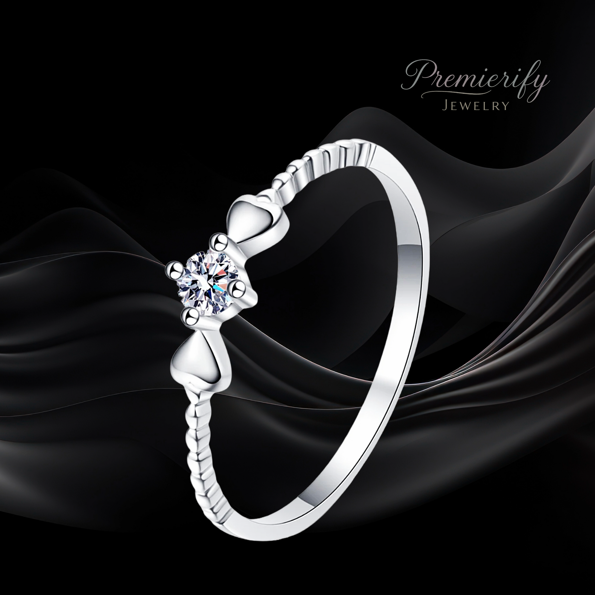 Silver ring with a diamond on a black fabric background, featuring the brand 'Premierify Jewelry'.