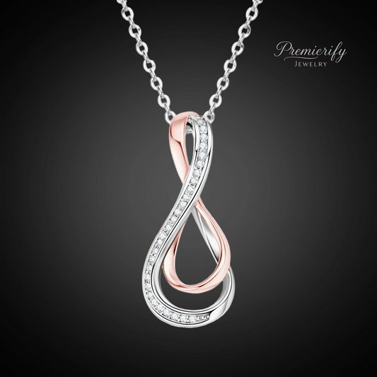 Two-toned infinity pendant necklace on a dark background with 'Premierify Jewelry' branding.
