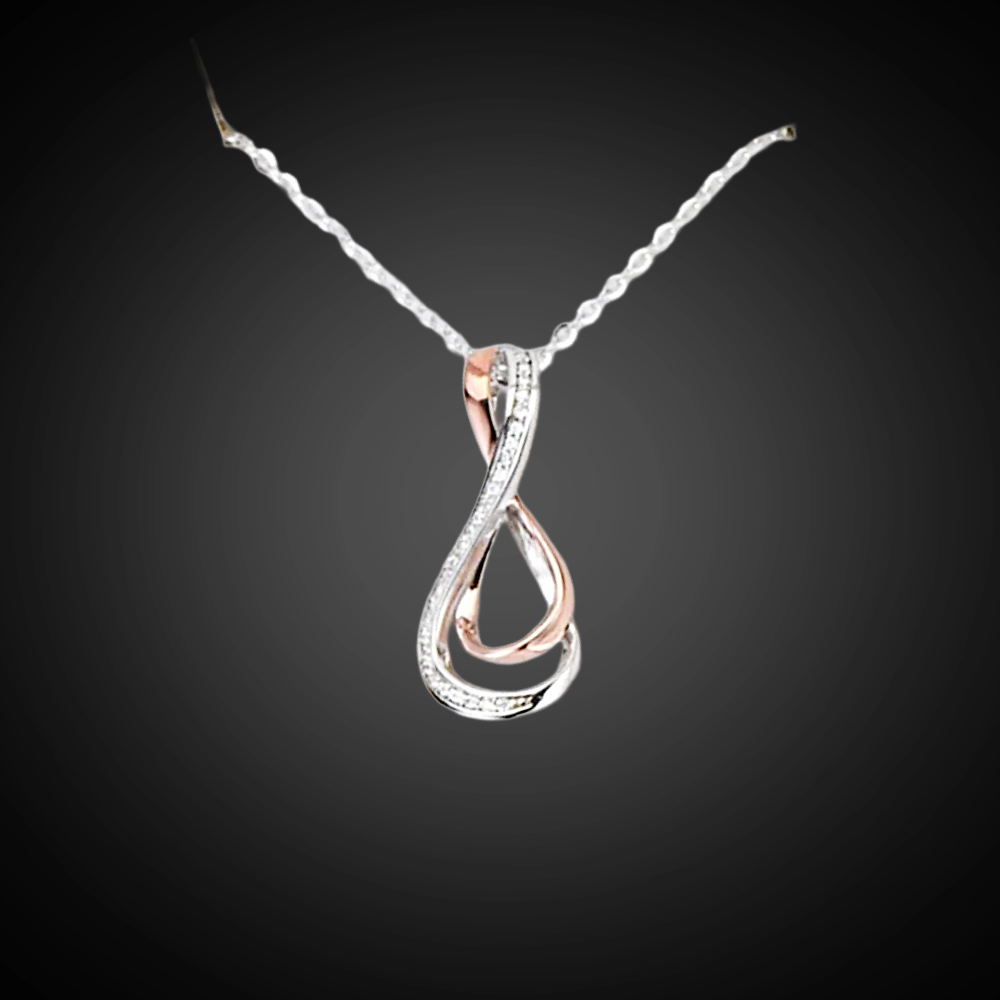 Silver and rose gold infinity pendant on a dark background