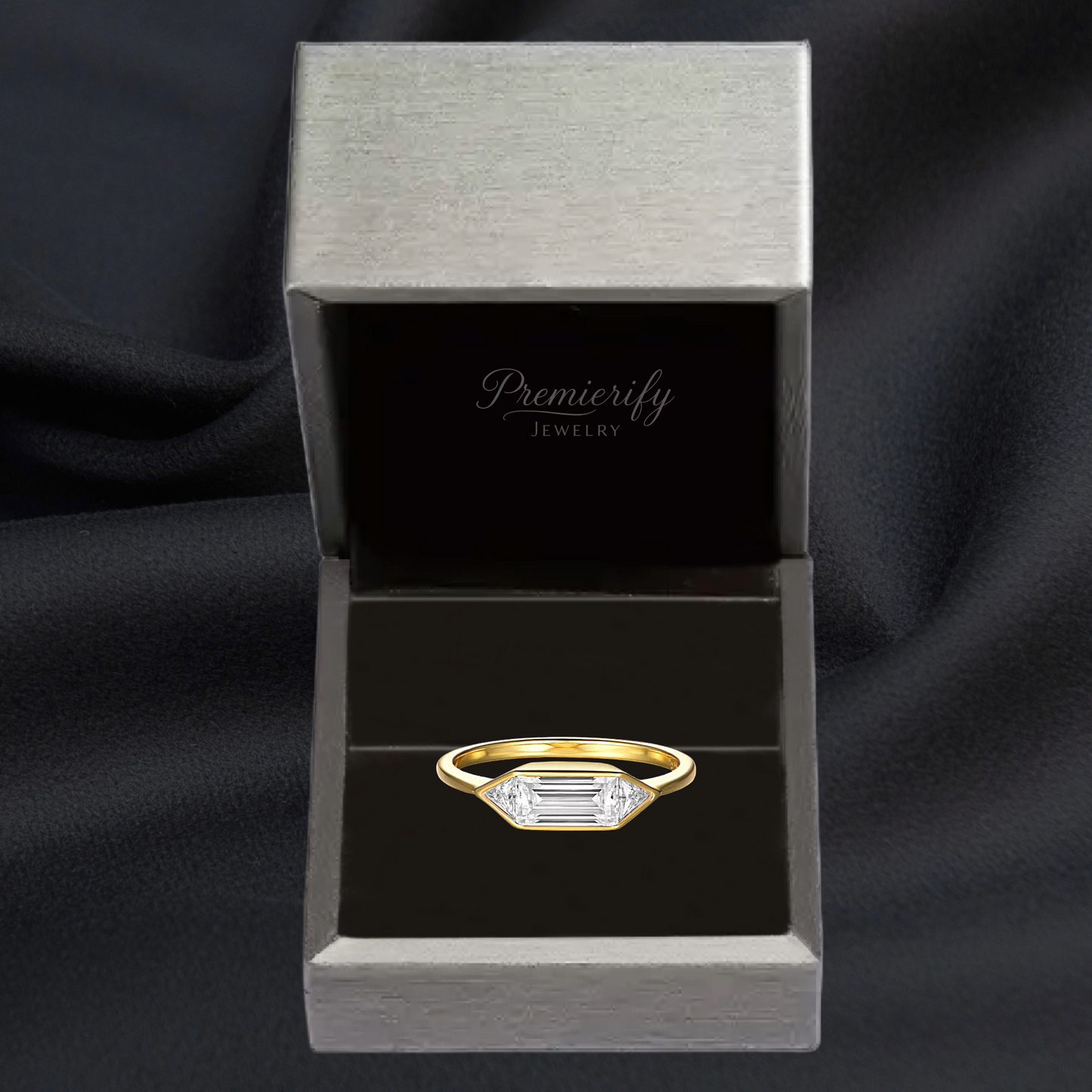 Gold ring with a diamond in a Premierify Jewelry box on a black background