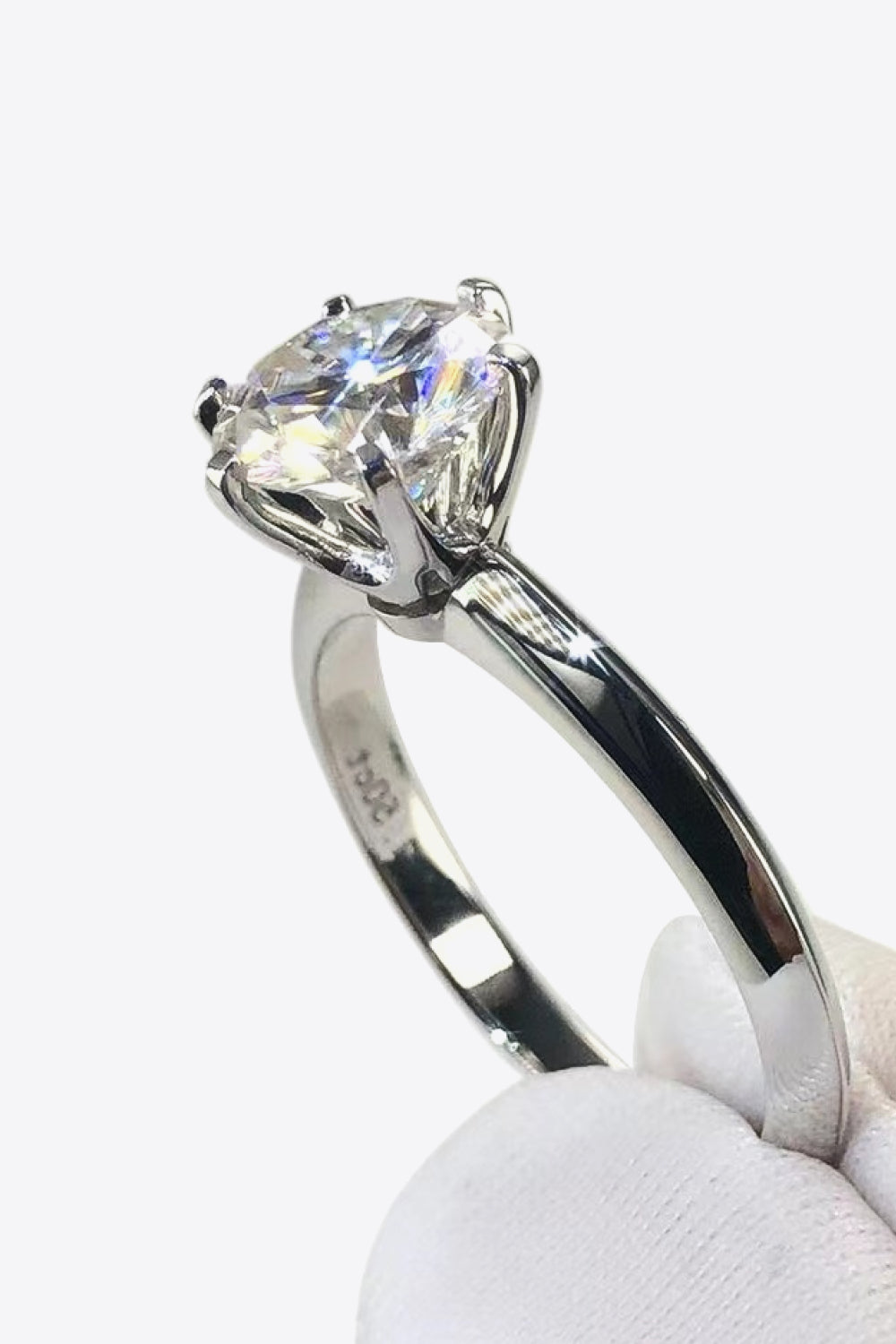 Side view of Kaitlyn Ann solitaire ring showcasing 6-prong setting and brilliant moissanite center stone