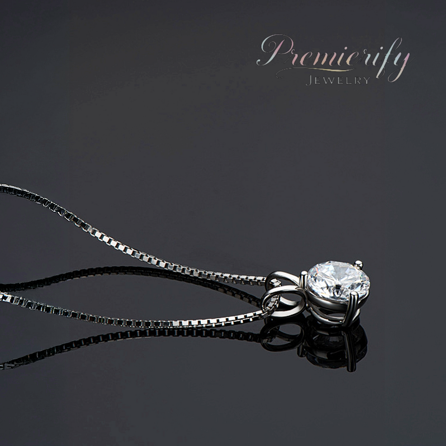 Silver necklace with a diamond pendant on a dark background, featuring the brand 'Premierify Jewelry'.