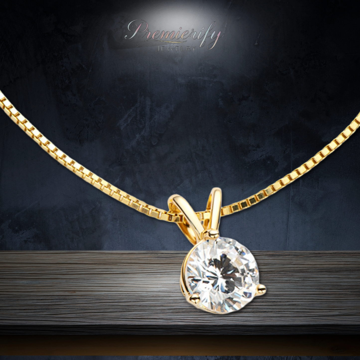 Gold necklace with a diamond pendant on a dark background