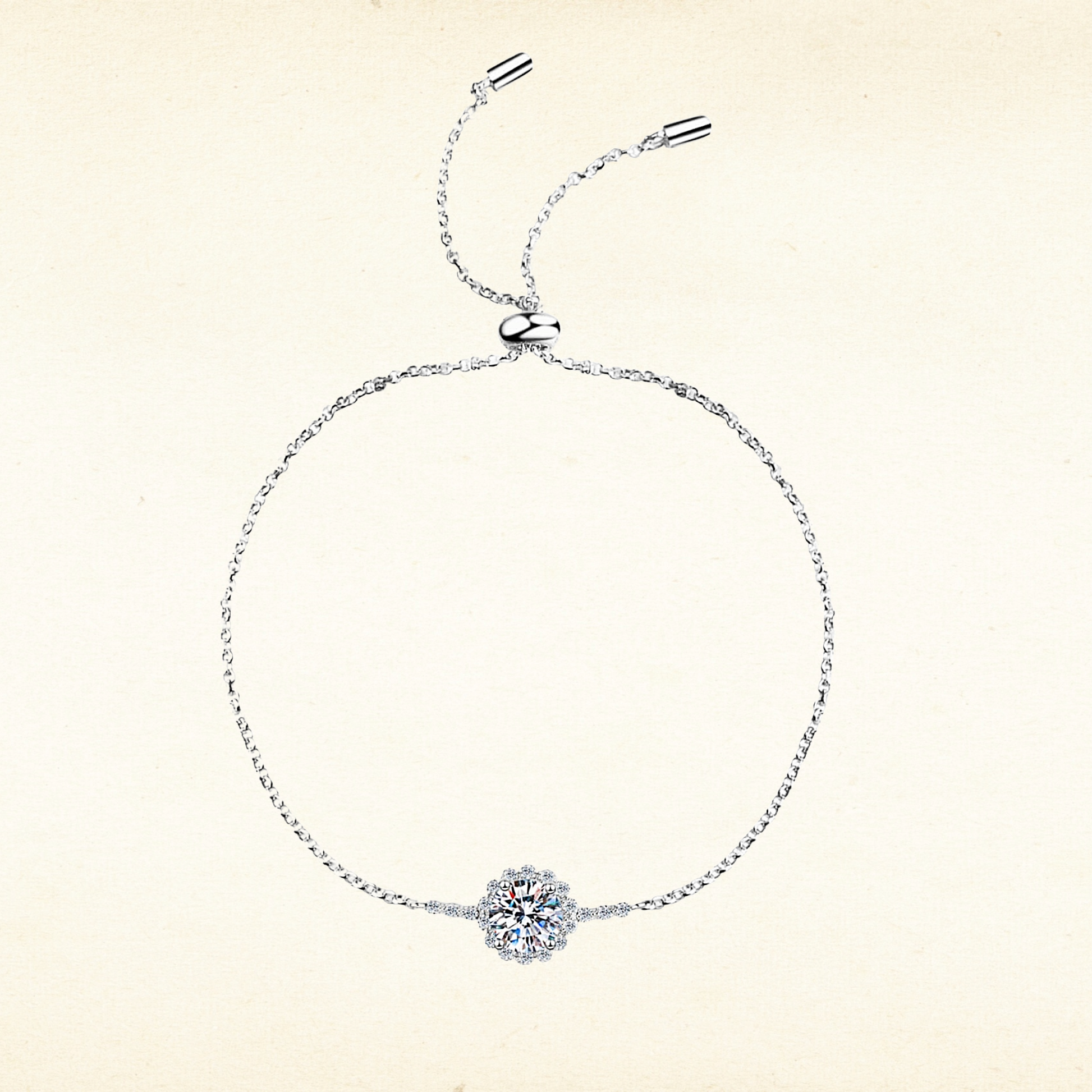 Silver bracelet with a central gemstone on a beige background