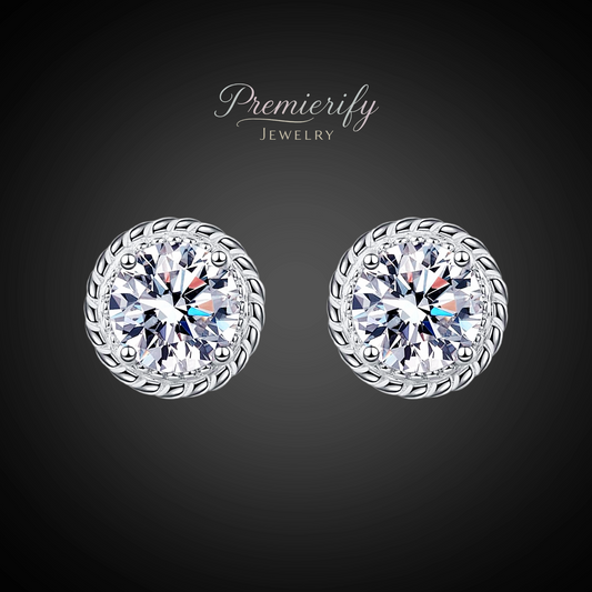 Pair of silver earrings with clear gemstones on a dark background, branded 'Premierify Jewelry'.