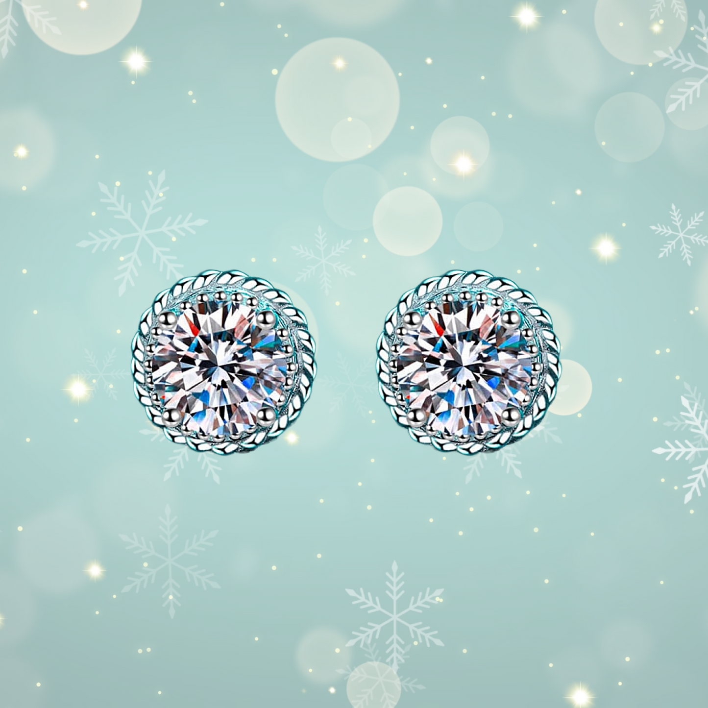 Pair of diamond earrings on a light blue background with snowflake designs