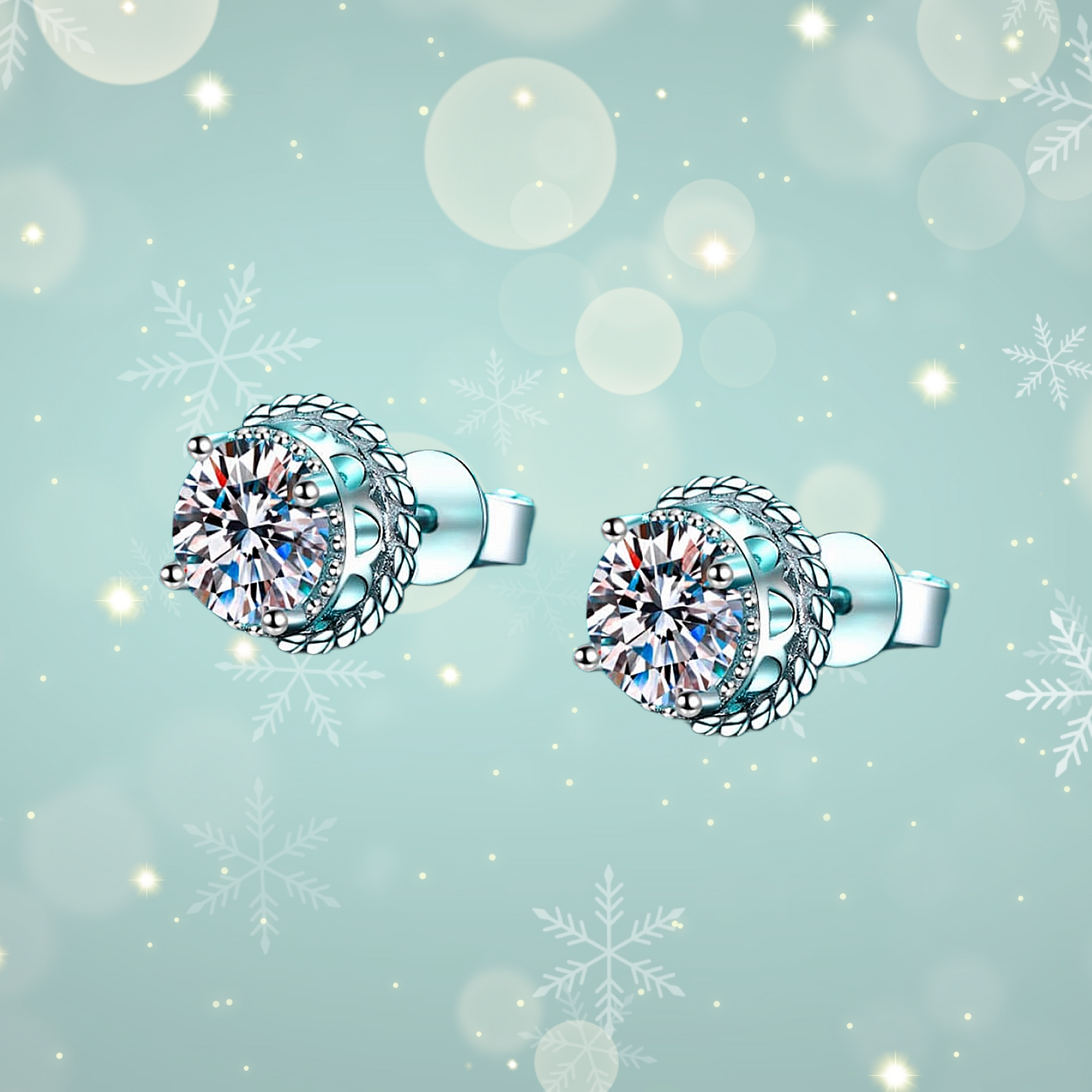 Pair of silver earrings with large gemstones on a light blue background with snowflakes.