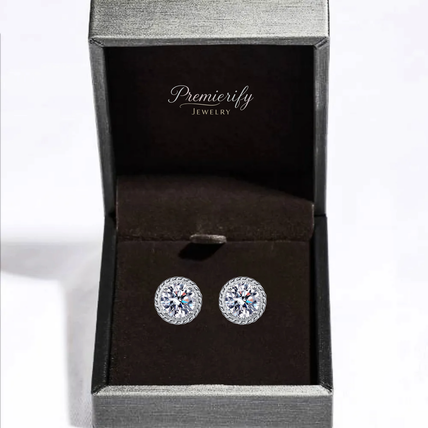 Silver round earrings in a Premierify Jewelry box on a white background