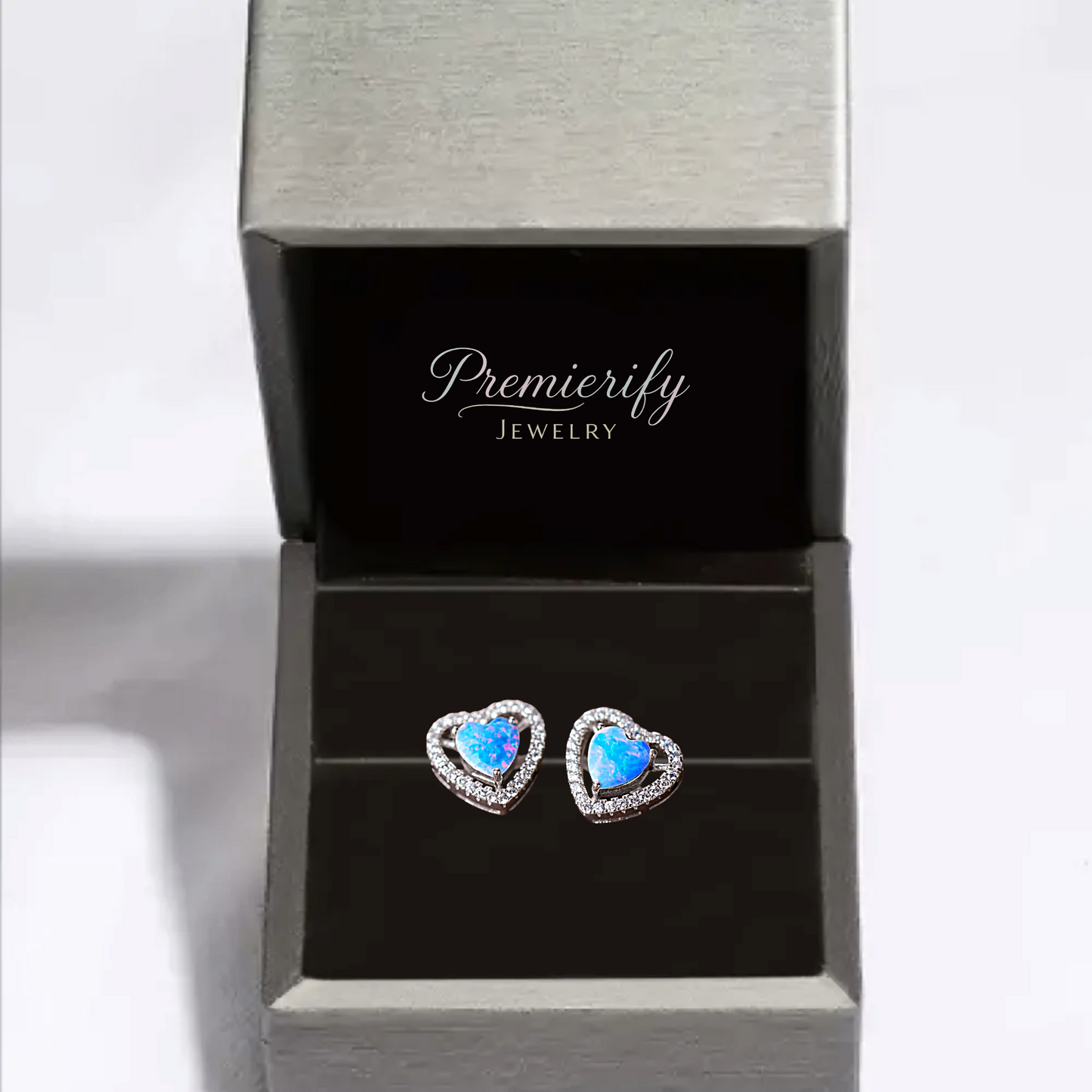 Heart-shaped opal earrings in a Premierify Jewelry box