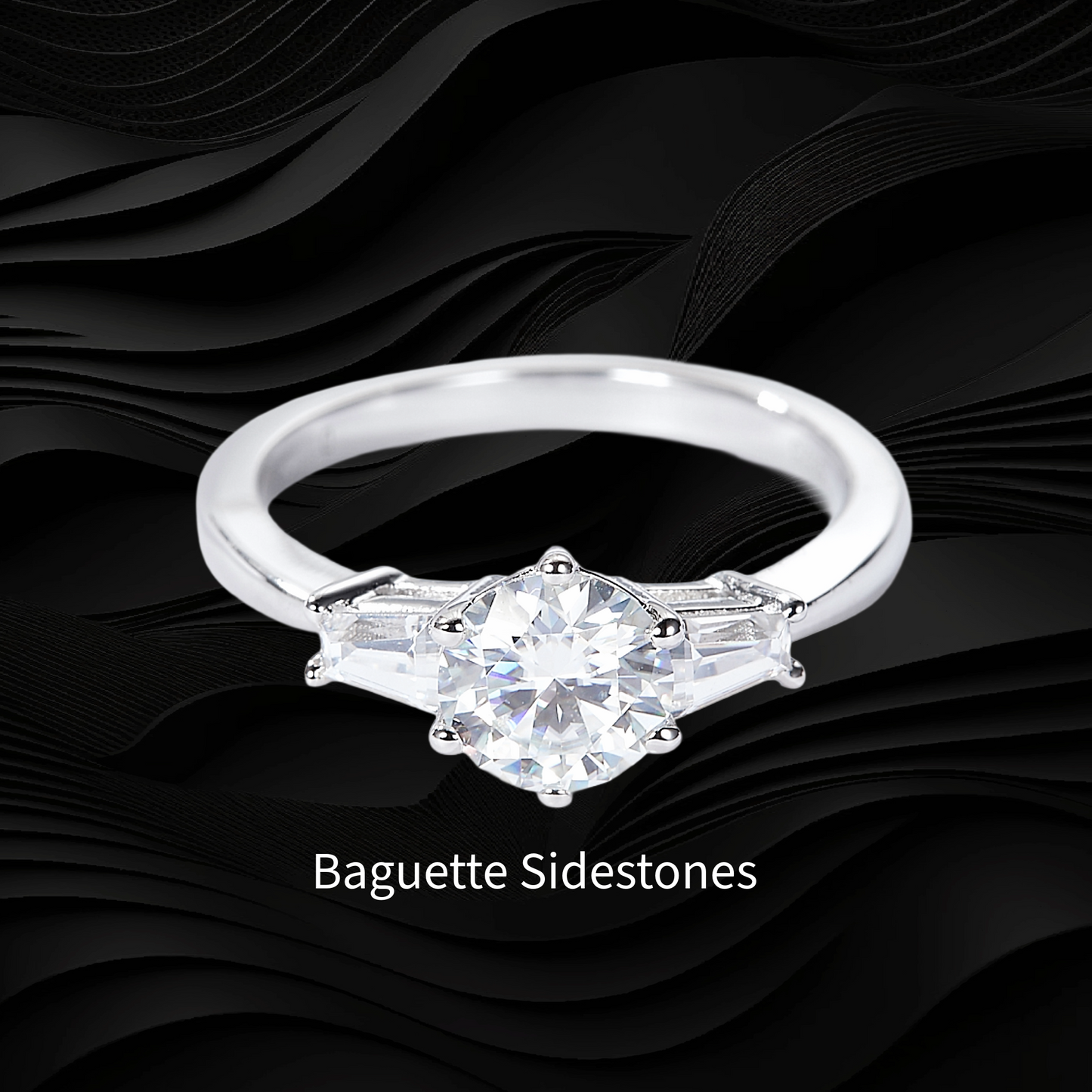 Silver ring with a large diamond and smaller baguette diamonds on a black wavy background