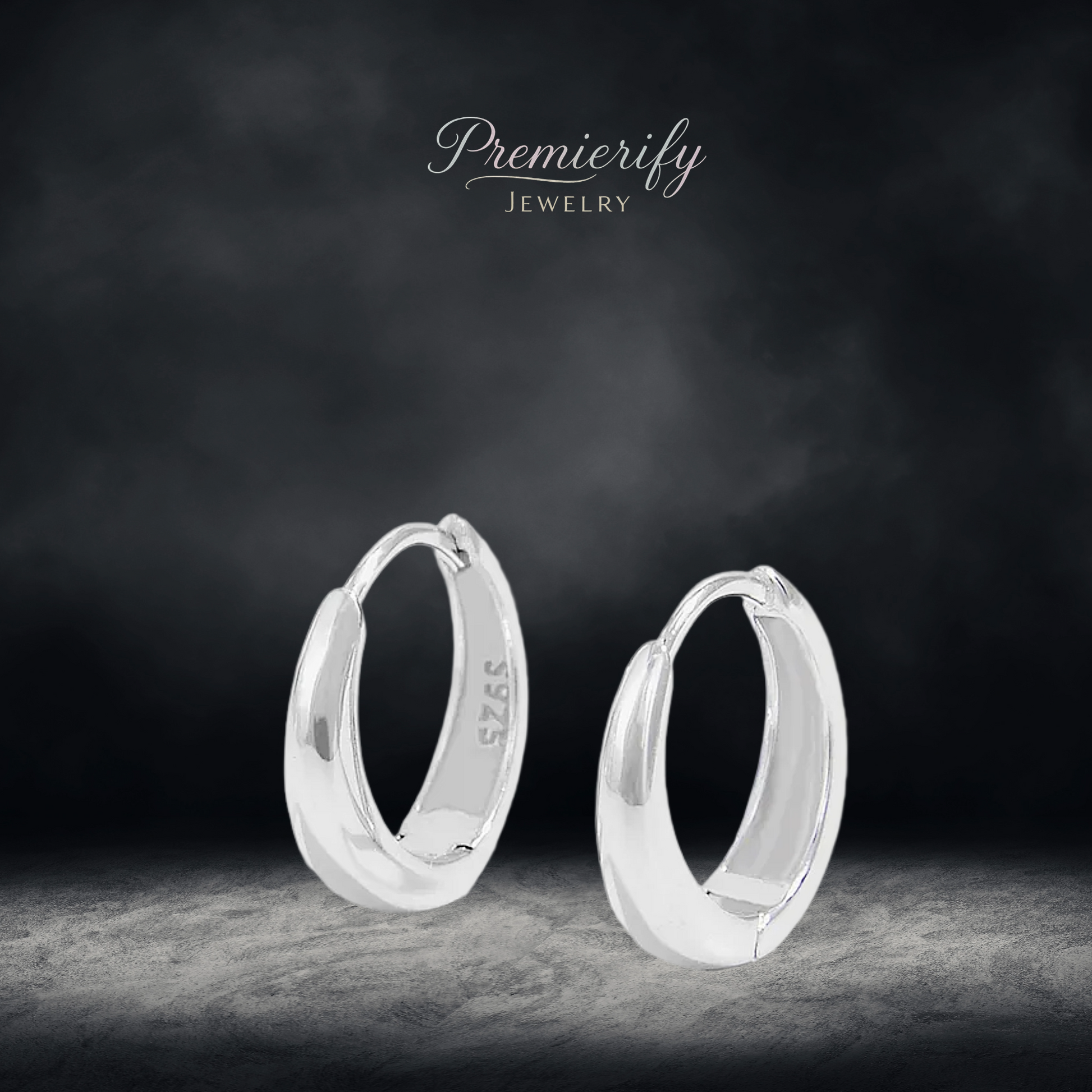 Silver hoop earrings on a dark background with 'Premierify Jewelry' branding.