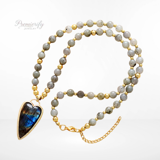 Necklace with Labradorite heart pendant on a white background