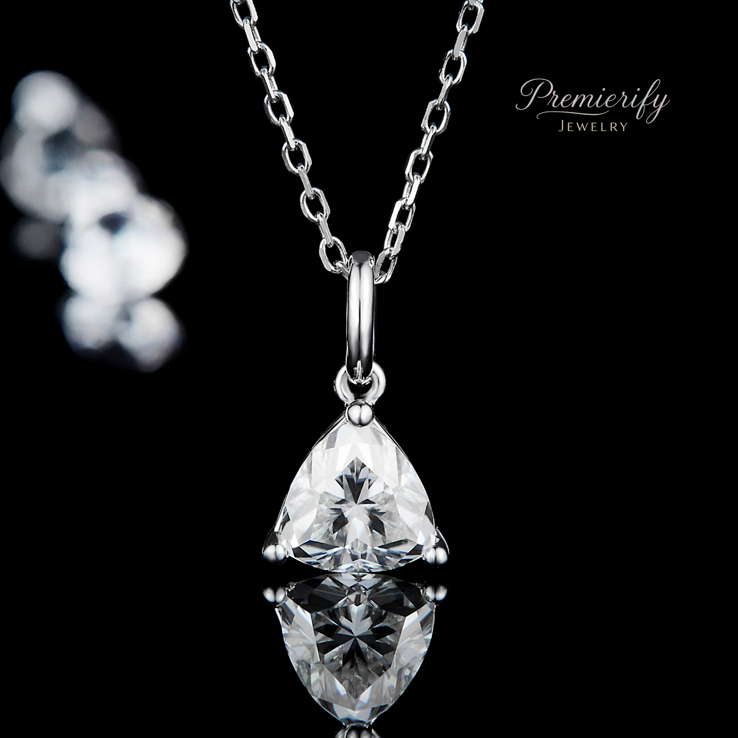 Silver pendant necklace with a clear gemstone on a black background, branded 'Premierify Jewelry'.