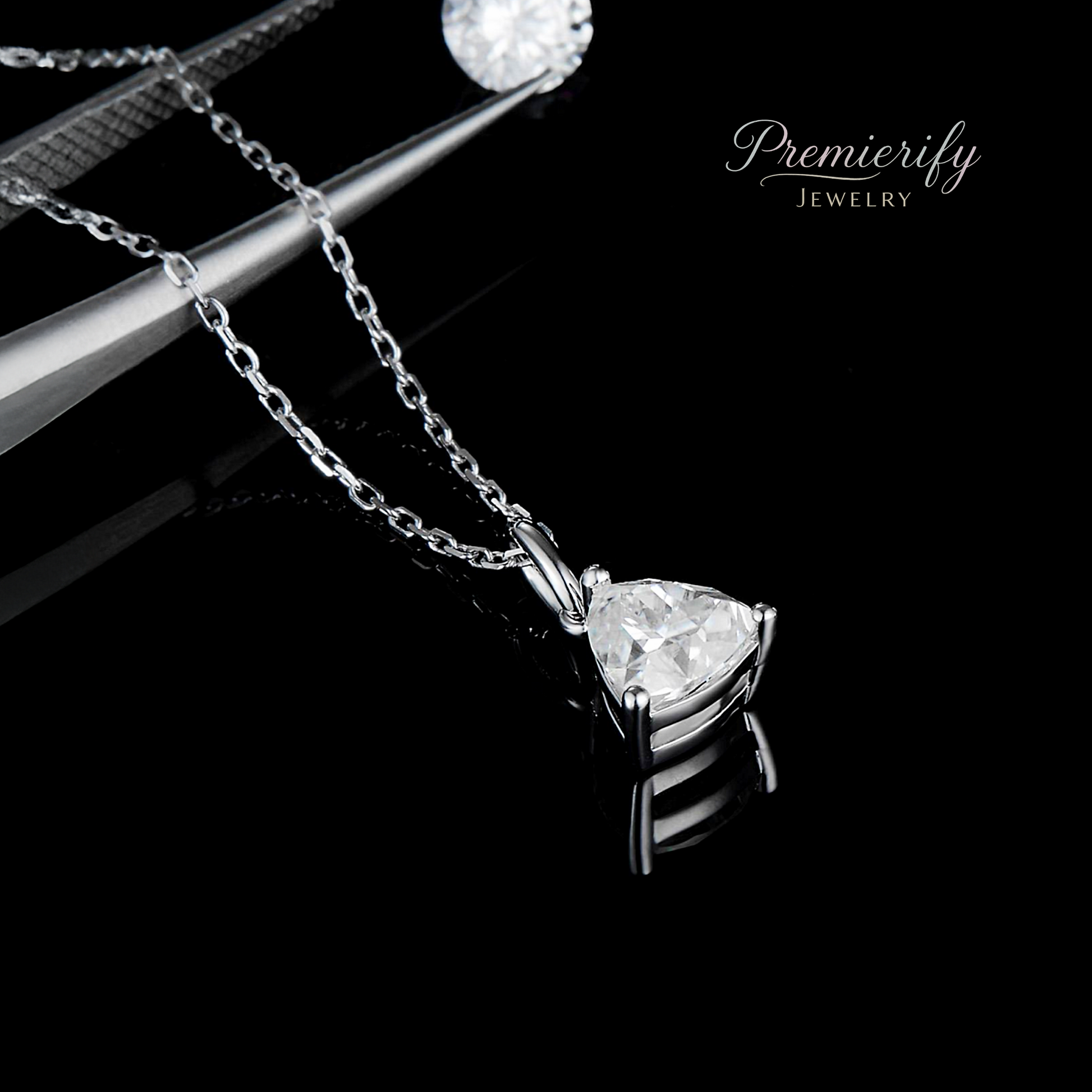 Silver necklace with a diamond pendant on a black background, featuring the 'Premierify Jewelry' brand.
